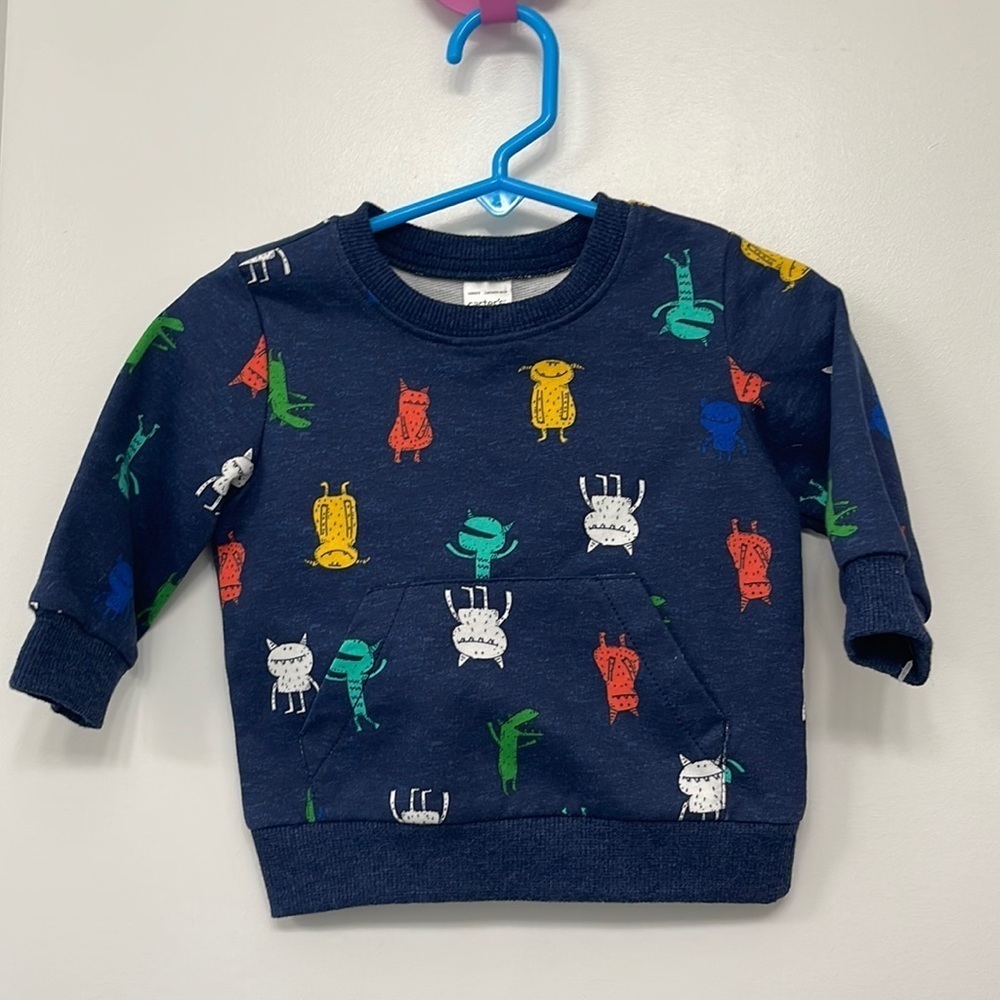 CARTER’S BLUE MONSTER SWEATSHIRT size 6 months